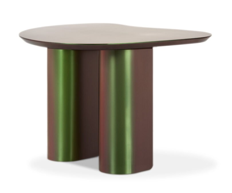 A modern iridescent table with an irregularly shaped top and cylindrical legs.