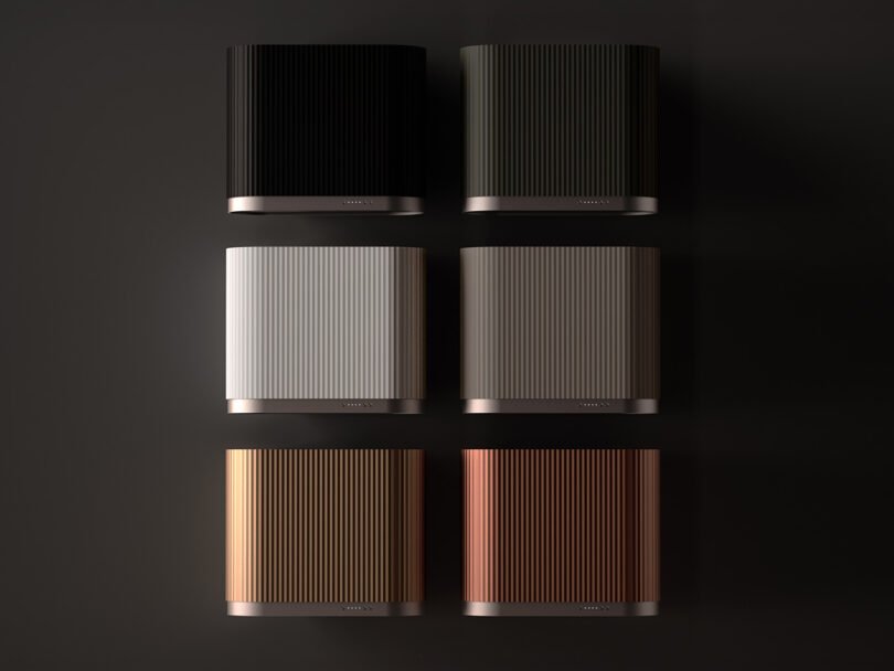 Six Mono kitchen hood filters by Ciarko Design arranged in two rows of three, featuring varying colors and ribbed textures on a dark background.