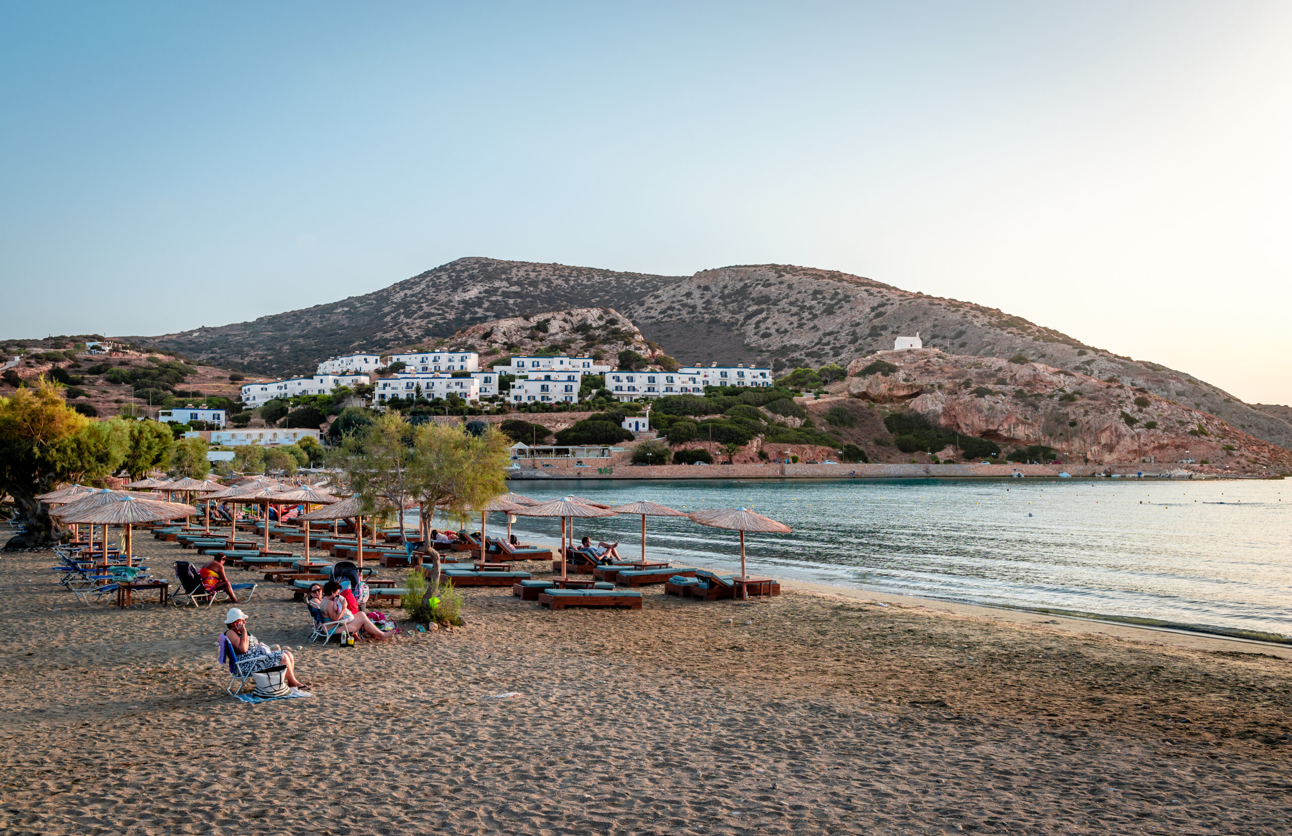 GettyImages-1343372523.jpg Swimmers enjoy the sunset at the beach. Galissas is a village in Syros Island, about 5 km far from Ermoupolis, the capital of the island.