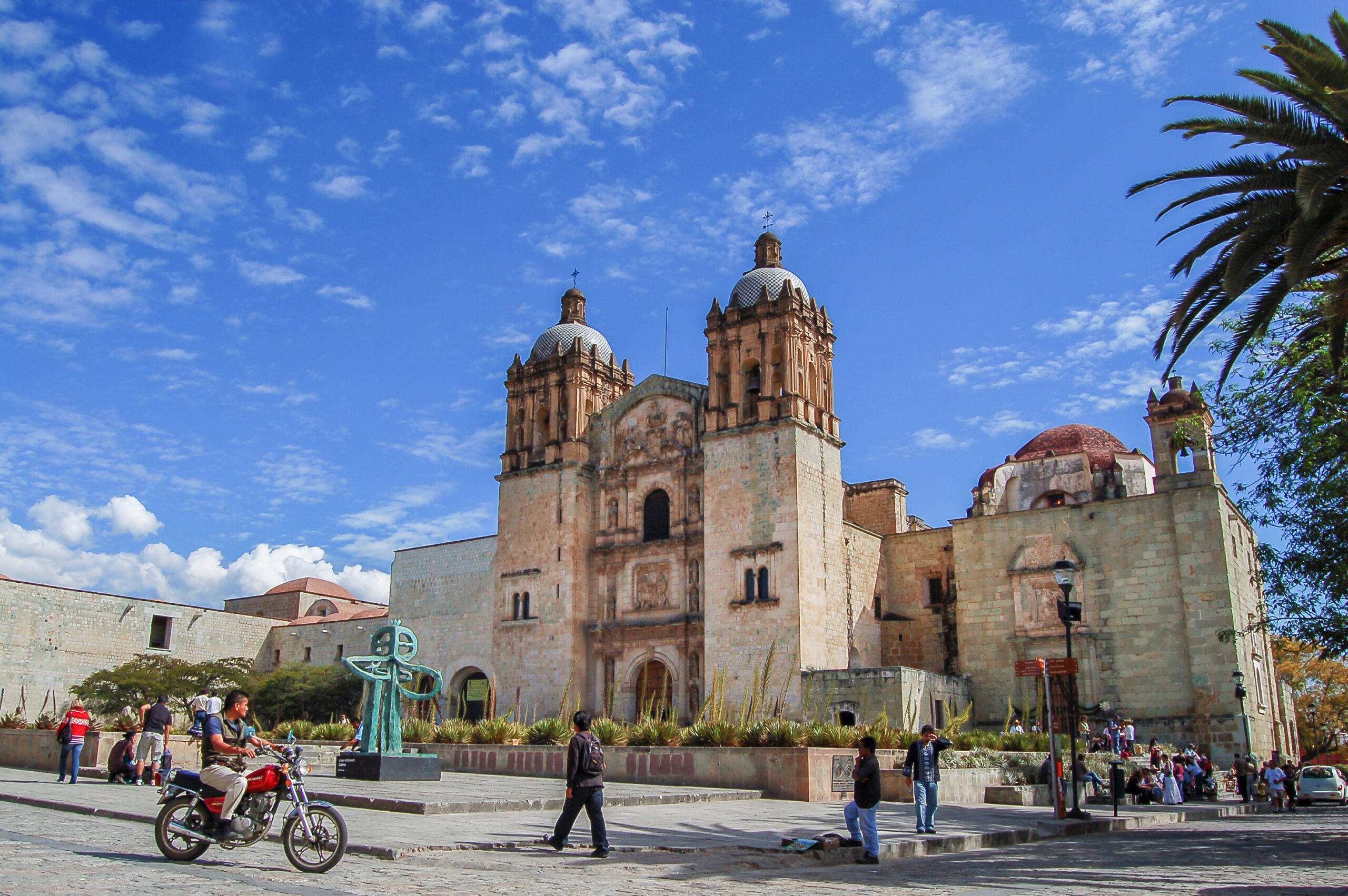 Mexico-Oaxaca--Elena-Diego-RFE-shutterstock1017901717.jpg A square by a church in Oaxaca with locals passing through