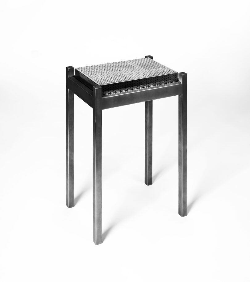 stainless steel metal stool on a white background