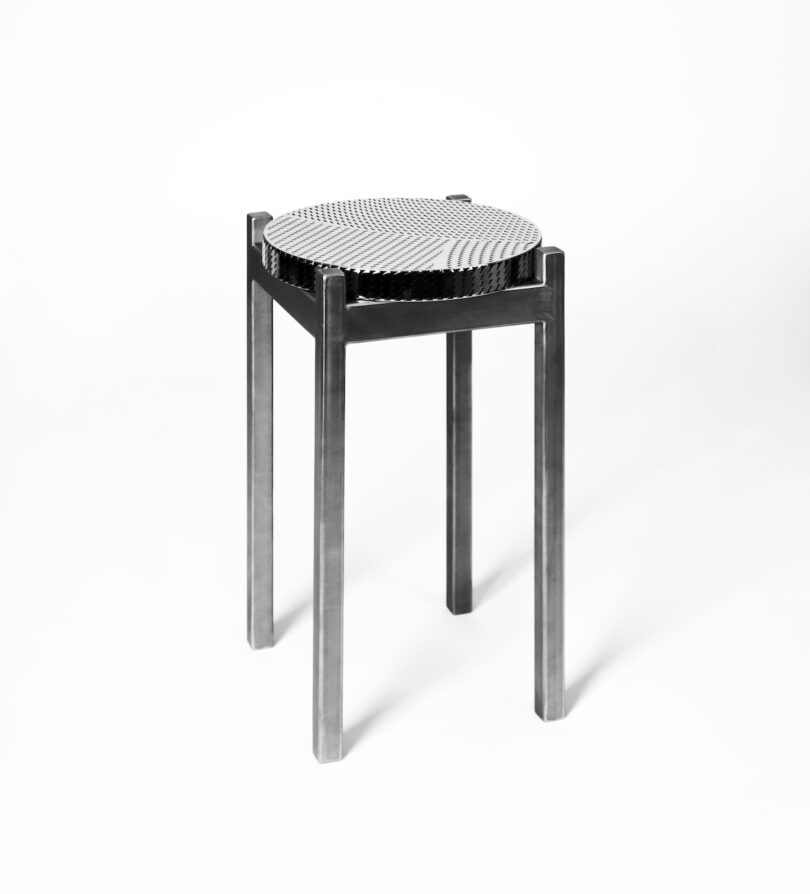 stainless steel metal stool on a white background