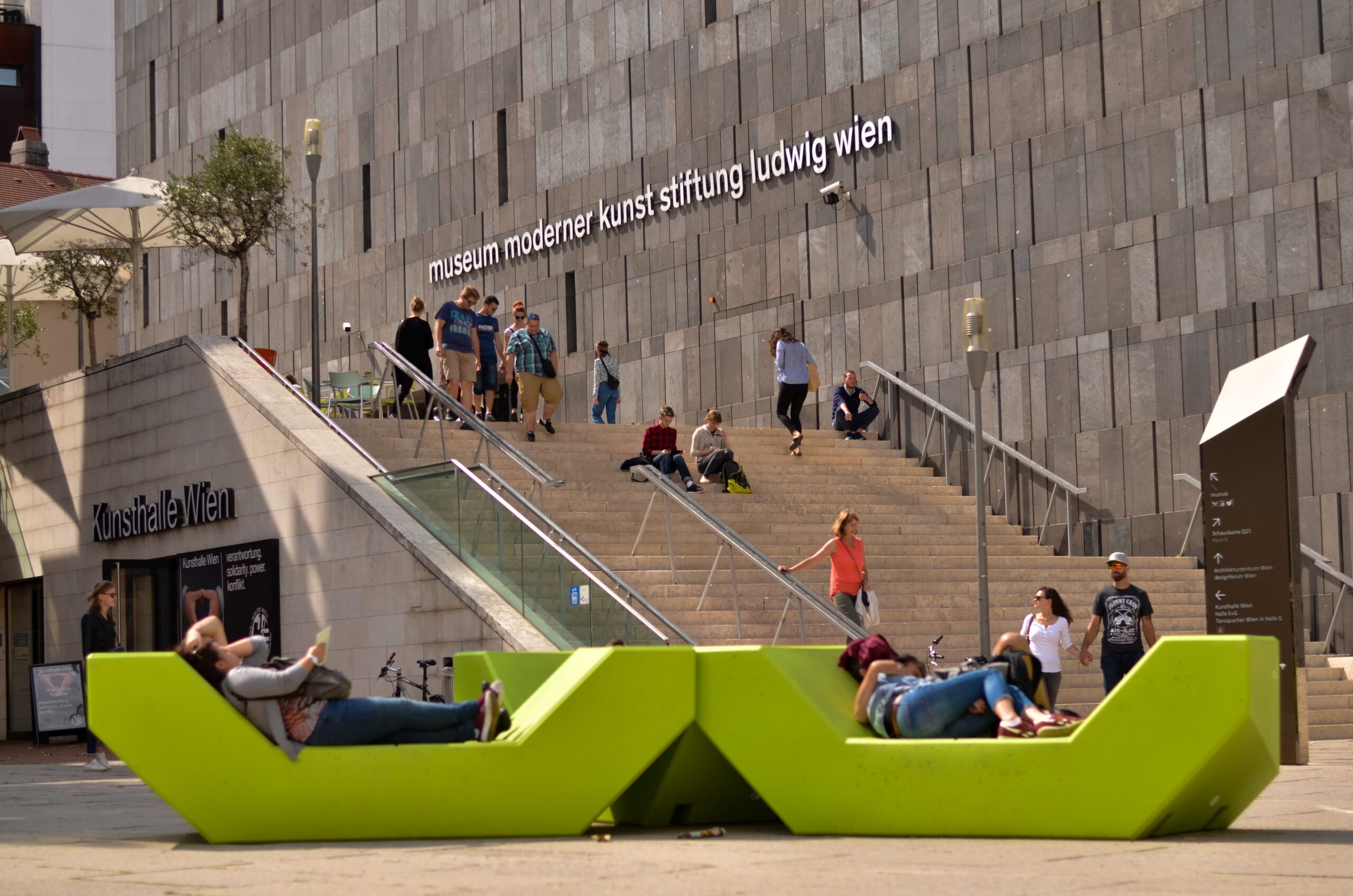 People on benches in front of MUMOK, MuseumsQuartier, Vienna, Austria