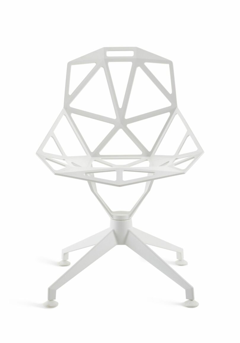 Geometric white chair with an open lattice design and a four-legged base