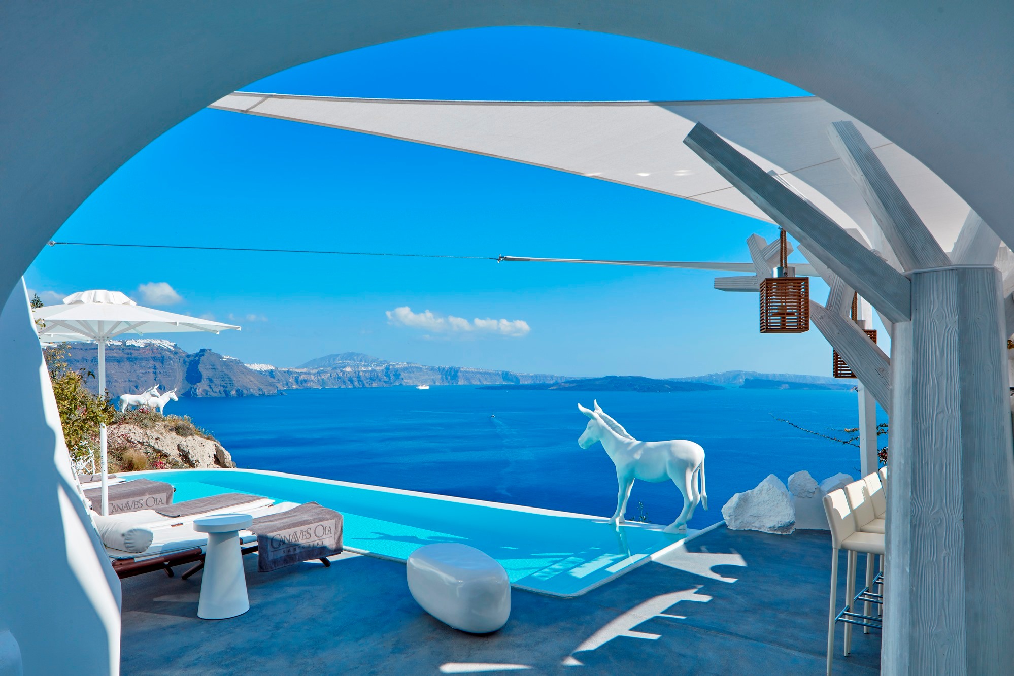 The infinity pool at the Canaves Oia Boutique Hotel, Santorini, Greece The infinity pool at the Canaves Oia Boutique Hotel, Santorini, Greece