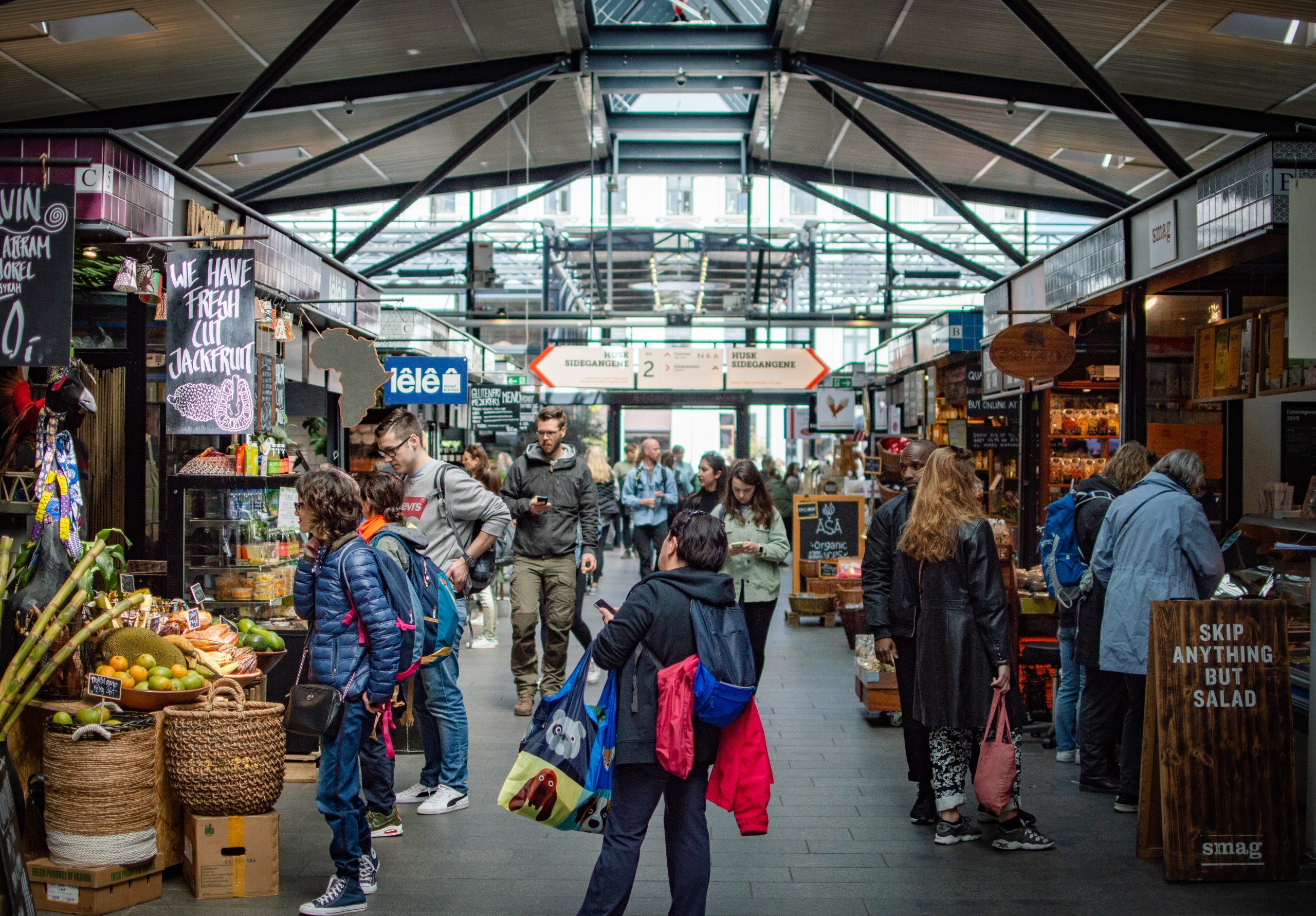 Torvehallerne, Copenhagen People wander through a covered food market in Copenhagen.